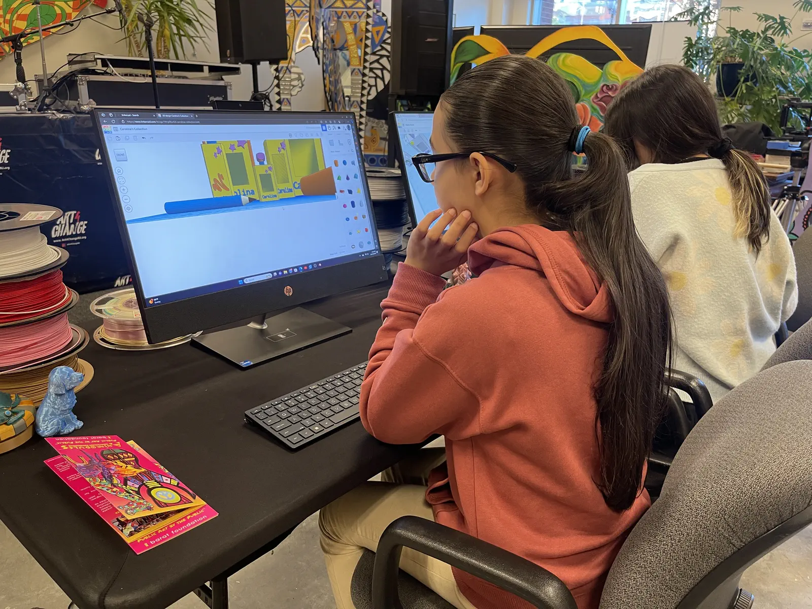 An adult learner prototyping at a Digi2U workstation